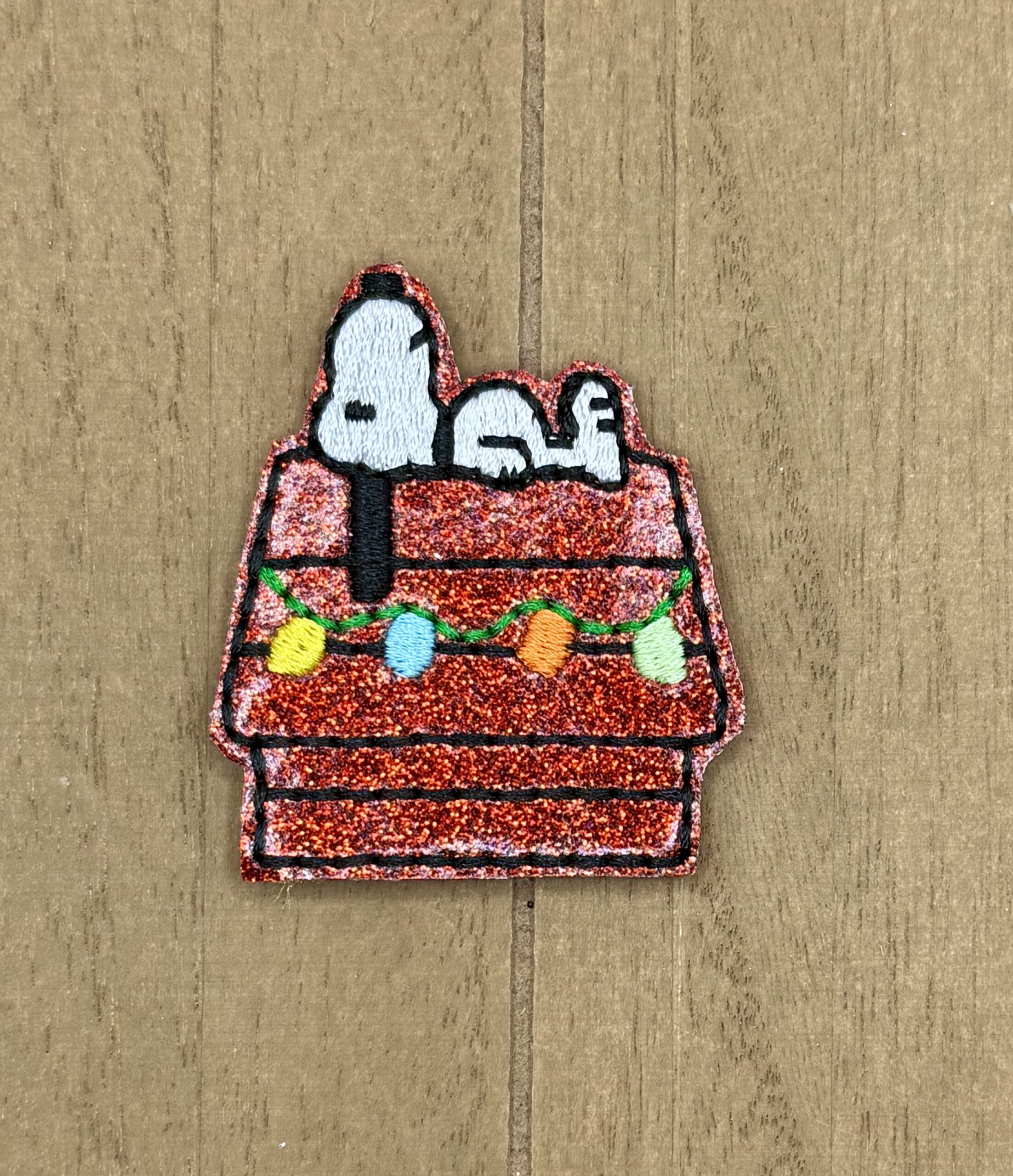 White Beagle on His Dog House with Lights